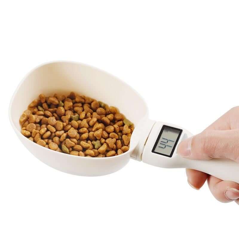Smart Pet Food Measuring Scoop with digital display, measuring kibble accurately for precise pet feeding.
